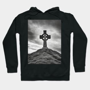 Ancient Stone Celtic Cross on a hill with the Sun shining through the cross in black and white. Hoodie